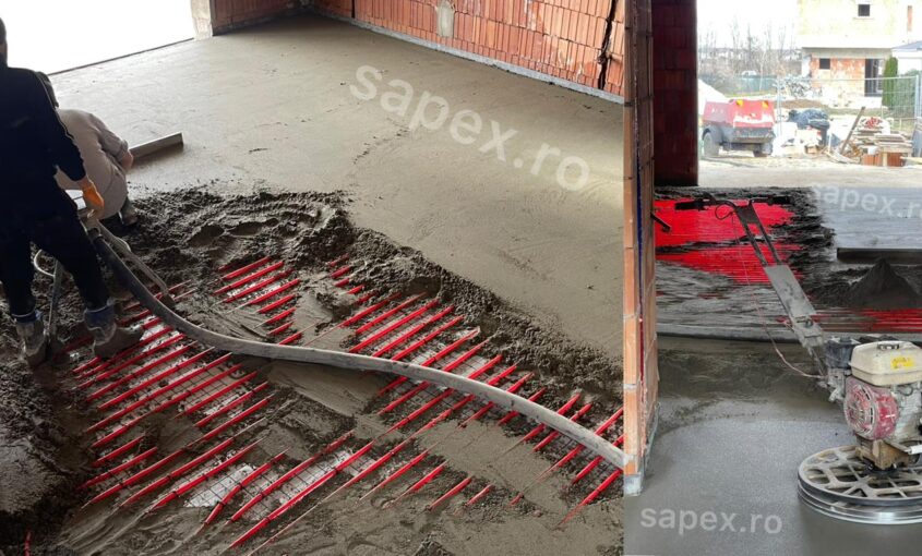 Șapă mecanizată peste încălzirea în pardoseală realizată pentru distribuția uniformă a căldurii